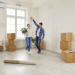 Young couple moving into new home